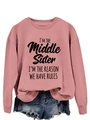 Detail of pink crewneck sweatshirt with 'I'M THE Middle SISTER' slogan print - Rose Gold (Black Font)