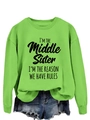 Detail of neon green sweatshirt featuring I'M THE MIDDLE SISTER black letter print - Neon Green (Black Font)