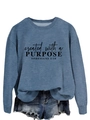 Detail of blue crewneck sweatshirt featuring black created with a PURPOSE text - S / Blue (Black Font)