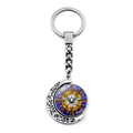 Detailed close-up of rotating double-sided moon dove pendant keychain in silver finish - Gold Blue Radial White Dove Style (JY008600-5)