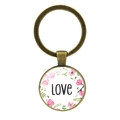 Dettaglio del portachiavi in bronzo vintage con pendente floreale e scritta Love - Bronzo Antico-Design Floreale Love (JY008619)