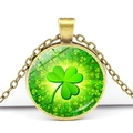 Macro shot of bronze vintage clover pendant with lucky green gemstone pattern necklace - Bronze Base Shamrock Gradient Background (Bronze 5)