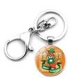 Detail of Oktoberfest keychain with cartoon sausage character and beer on white background - Cartoon Sausage Character (JY008655-15)