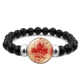 Detail of black beaded bracelet featuring a vintage red maple leaf charm and silver spacers - Vintage Scratched Maple Leaf Pattern (XSWX8423-7)