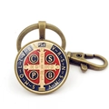 Detailed close-up of Saint Benedict Medal keychain with vintage bronze finish and lobster clasp - Vintage St. Benedict Medal Style 10 (Copper JY008670-10)