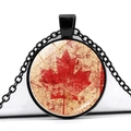 Macro detail of Canada flag necklace pendant with red maple leaf and antique texture - Retro Grunge Beige Background Style (JY008658-7)