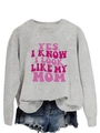 Close-up of pink letter print on grey long sleeve sweatshirt and denim shorts - S / Gray