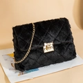 Quilted black faux fur shoulder bag with gold chain strap and twist lock closure - Black