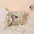 Detailed macro of large gold sequins on off-white crossbody bag with golden hardware - Off White