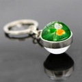 Macro shot of Ireland flag shamrock glass cabochon pendant with silver metal keychain - Radial Flare Shamrock Style 10 (JY008703-10)