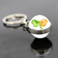 Macro shot of double-sided glass ball keychain with Irish shamrock pattern - Heart Tricolor Shamrock Style 9 (JY008703-9)