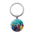 Close-up of circular keychain pendant with colorful hand-painted house and flower artwork - Blue Floral House & Tree Pattern (JY008713-Silver 8)