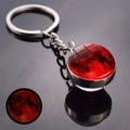 Luminous red moon planet keychain with detailed lunar surface on dark reflective surface - Red Style (JY008727-12)