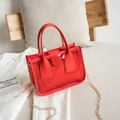 Chic red transparent PVC crossbody handbag with golden metal chain strap and top handles - Red