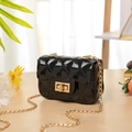 Mini black jelly shoulder bag with quilted pattern and golden chain strap - Black