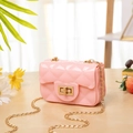 Pink quilted mini jelly bag with golden twist lock and elegant metal chain strap - Pink