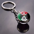 Close-up of Palestine flag emblem keychain with glass cabochon on a reflective surface - Palestine Coat of Arms Eagle Style (JY008766-10)
