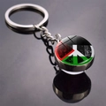 Detail view of Palestine flag and peace sign on glass ball keychain with metal ring - Peace Sign Flag Style (JY008766-7)