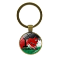 Bronze-Schlüsselanhänger mit Glasdom und I Love Palästina-Flaggenmotiv-Design - Einschussloch-Herz (I Palestine) / Bronze