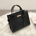 Structured black lychee pattern leather handbag with gold metal plate on plush mat - Black