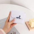 Short white PU leather wallet with embossed leaf texture and blue decorative clasp - Purple