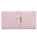 Detail of light purple long wallet with puzzle metal clasp and smooth leather texture - Pink