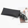 Black leather sunglasses pouch with metal hook and self-closing spring clip closure - With Hook Style / Black