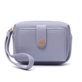 Close-up of lavender PU leather coin purse with lychee texture and gold snap button - Purple Blue