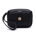 Close-up of black litchi grain leather coin purse with golden logo buckle and wrist strap - Black