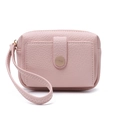 Detail of pink pebbled leather coin purse with golden circular hardware and wrist strap - Pink