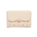 Detail of cream floral wallet with 3D flower clasp and printed petal patterns - Apricot