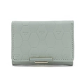Detail of mint green PU leather wallet with geometric hexagonal embossing and metal clasp - Green