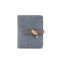 Detail of grey short wallet featuring leaf patterns and gold-tone leaf pendant charm - Sky Blue
