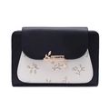 Detail of floral wallet with black and white lychee leather and gold leaf charm - Black