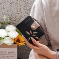 Women's foldable black wallet with colorful leaf print and golden bird-shaped metal clasp - Black