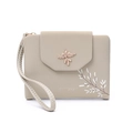 Detail of beige wallet featuring rose gold bird emblem and white branch floral print - Green