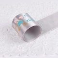 Silver satin ribbon roll with printed Love is text and heart motifs for gift wrapping - Wide Version / Gray