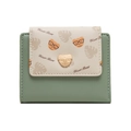 Detail of compact women's wallet with cartoon bear print and gold bear metal clasp - Green