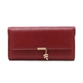 Detail of burgundy long wallet with leaf pendant and quilted pattern on flap - Burgundy