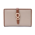 Close-up of beige pebble leather wallet with brown strap and gold infinity buckle - Apricot