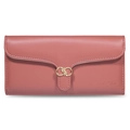 Detail of dusty pink long wallet featuring golden leaf metal clasp and premium PU leather - Coral
