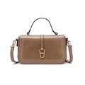 Detail of a brown crossbody phone bag with contrast stitching and a metal buckle - Camel