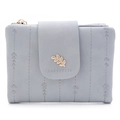 Detail view of leaf-shaped embroidery and gold leaf metal clasp on gray blue wallet - Sky Blue