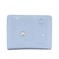 Close-up of light blue trifold wallet with floral embroidery and brand logo detail - Light Blue
