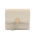 Close-up of cream PU leather tri-fold wallet featuring flower charm and metal pendant detail - Green
