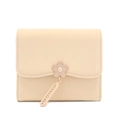 Close-up of cream tri-fold wallet featuring flower clasp and PRETTYZYS metal pendant - Apricot Yellow