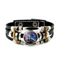 Detailansicht der Drachengrafik auf Lederarmband mit Metallperlen und Druckknopf - Lila-Blauer Kunstdrache (JY008832-3)