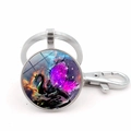 Blue dragon glass dome keychain with purple wings and a galaxy background on a white base - Silver Style 4