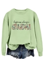 Detail of sage green sweatshirt showing ribbed cuffs and grandma print design - Olive Green Sweatshirt (Black Text Pattern)