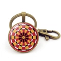 Detail of vintage bronze keychain with glass cabochon dartboard pattern and lobster clasp - Style 4 / Bronze